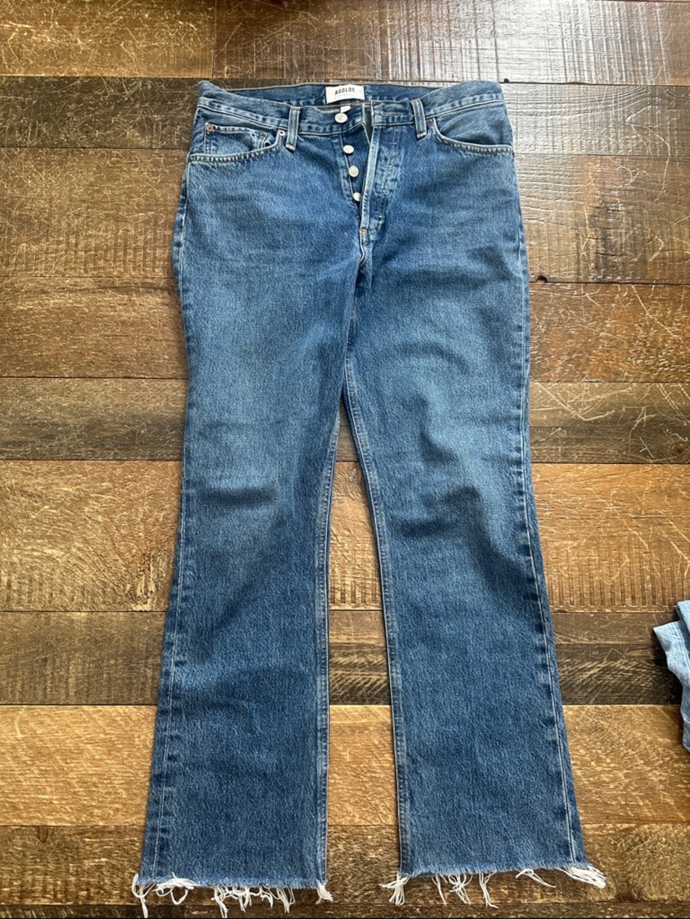 Agolde Blue High-Rise Flare Jeans with Raw Hem